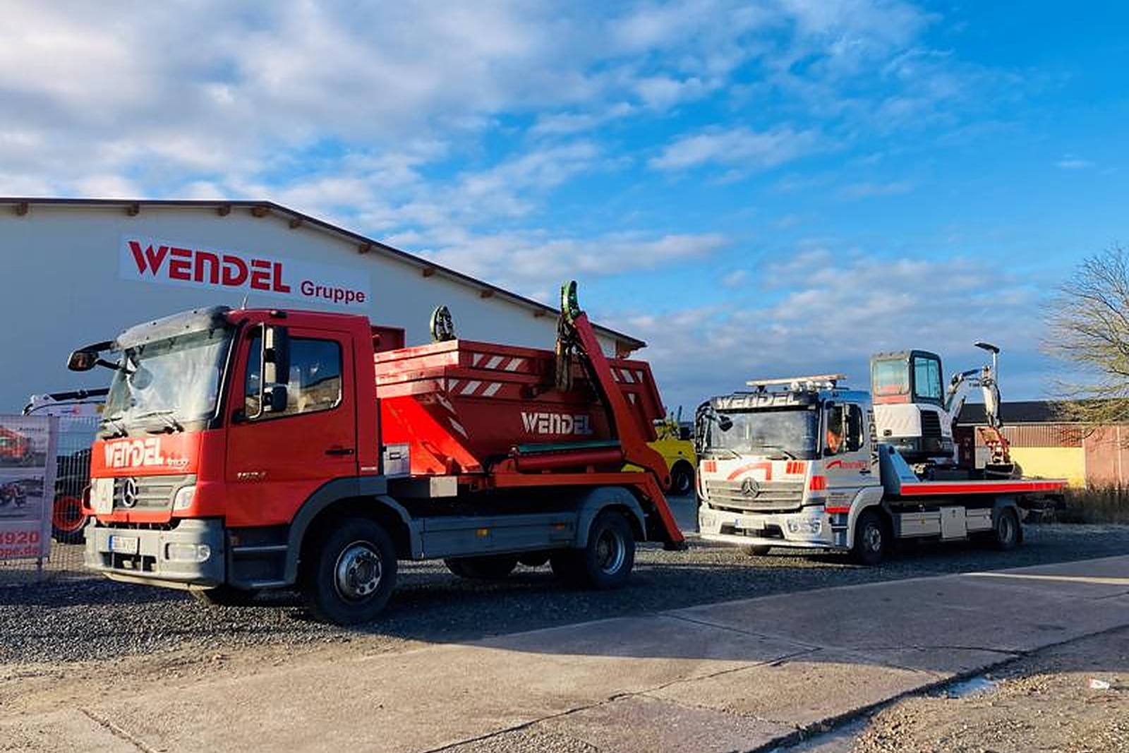 Wendel container truck and transporter in front of the Wendel Gruppe hall in Riedstadt